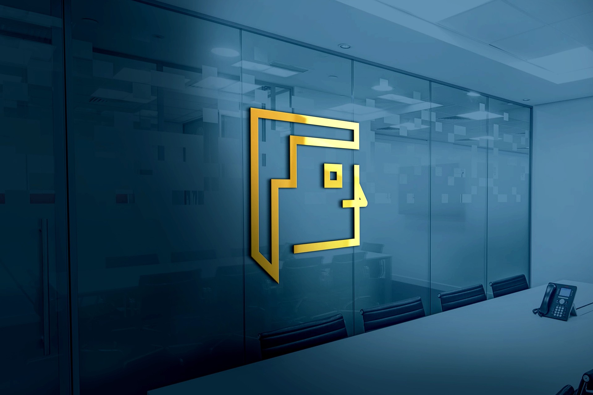 3D-rendered golden face logo design on a wall in a corporate office meeting room